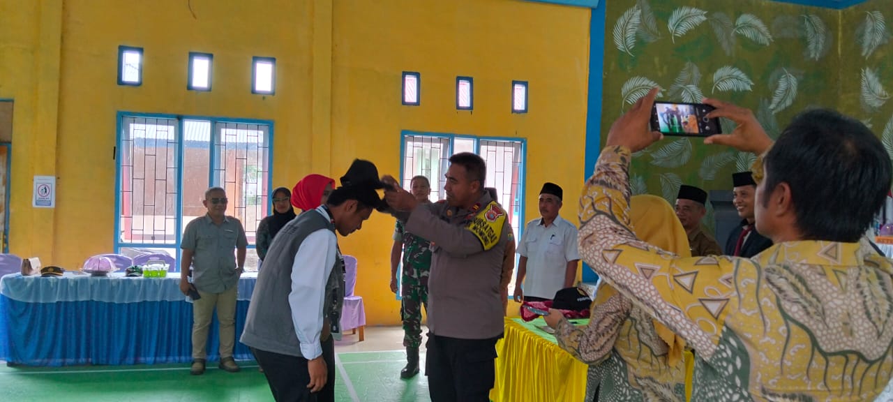 Kasubsatgas Polsek Momunu Hadiri Pelantikan PTPS Pilkada Serentak 2024