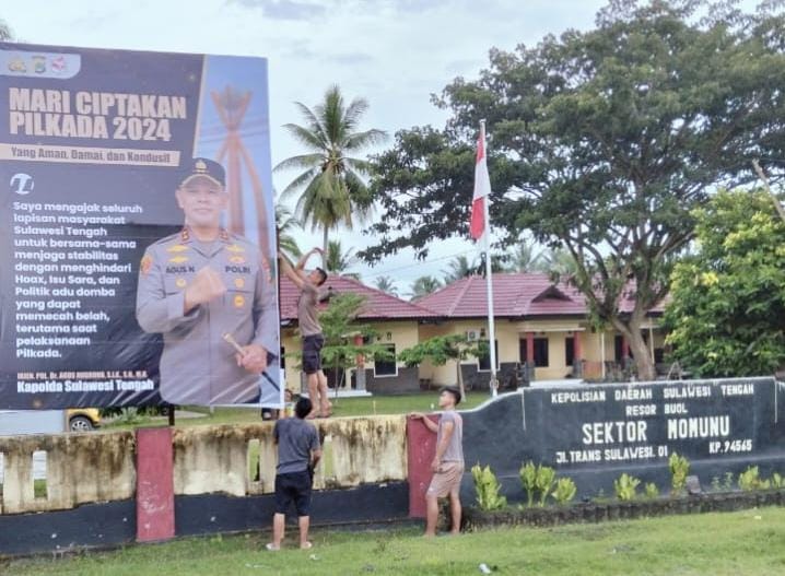 Polres Buol Pasang Baliho Himbauan Kapolda Sulteng Jelang Pungut Suara Pilkada 2024