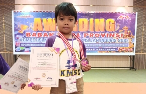SISWA SDN 3 PANCOR LOTIM REVAN DIRGA KURNIAWAN RAIH MEDALI PERUNGGU DAN LOLOS KE OLIMPIADE NASIONAL KMSI
